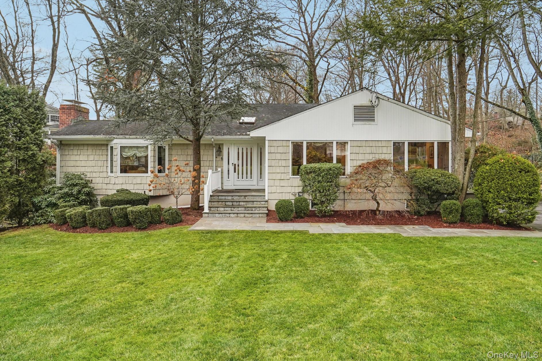 Welcome to 6 Robins Roost in Rye Brook — a rare gem offered for the fi...
