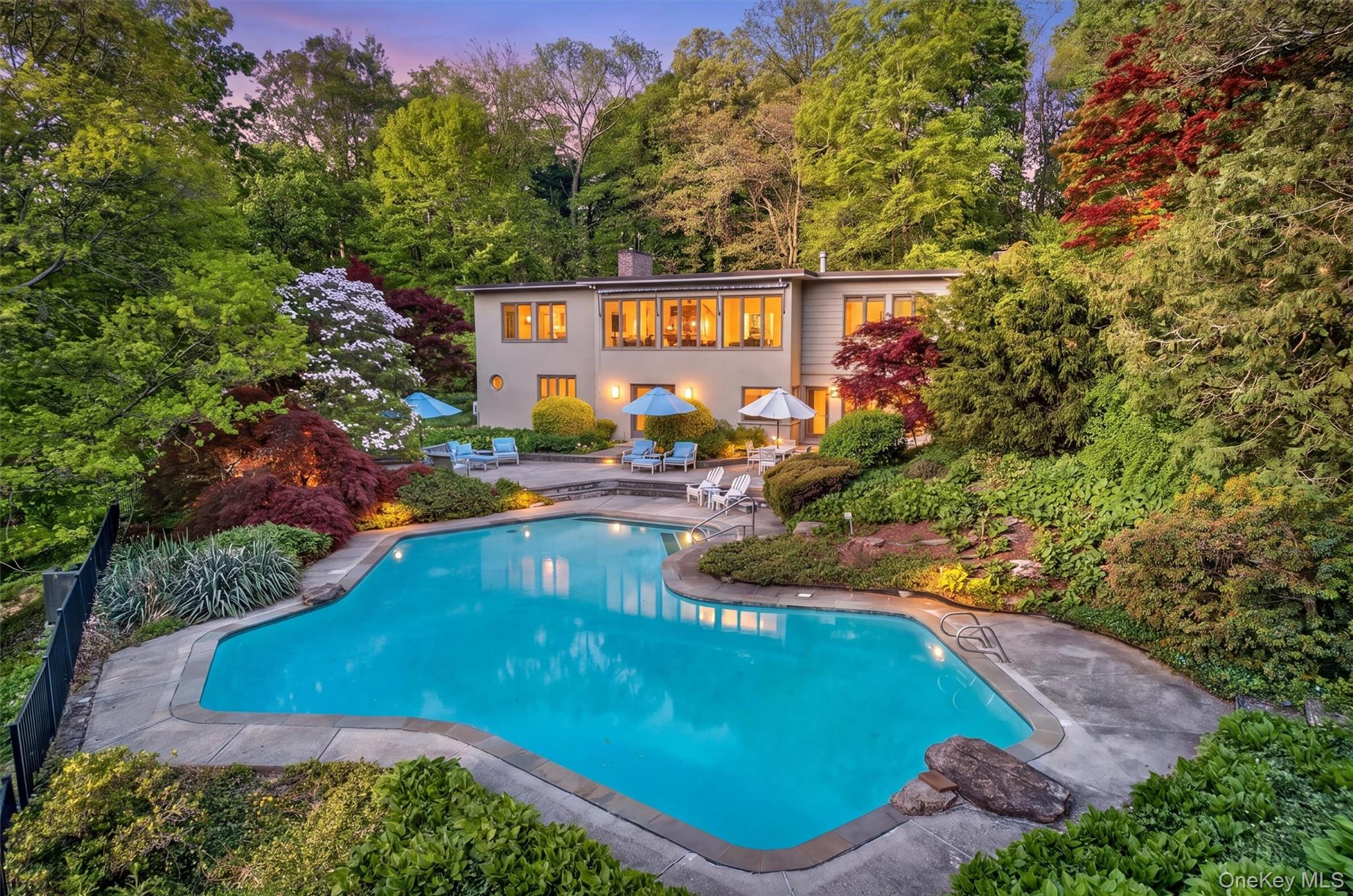 Impeccable Mid Century Modern is truly a retreat! Sited on 3.8 tranqui...