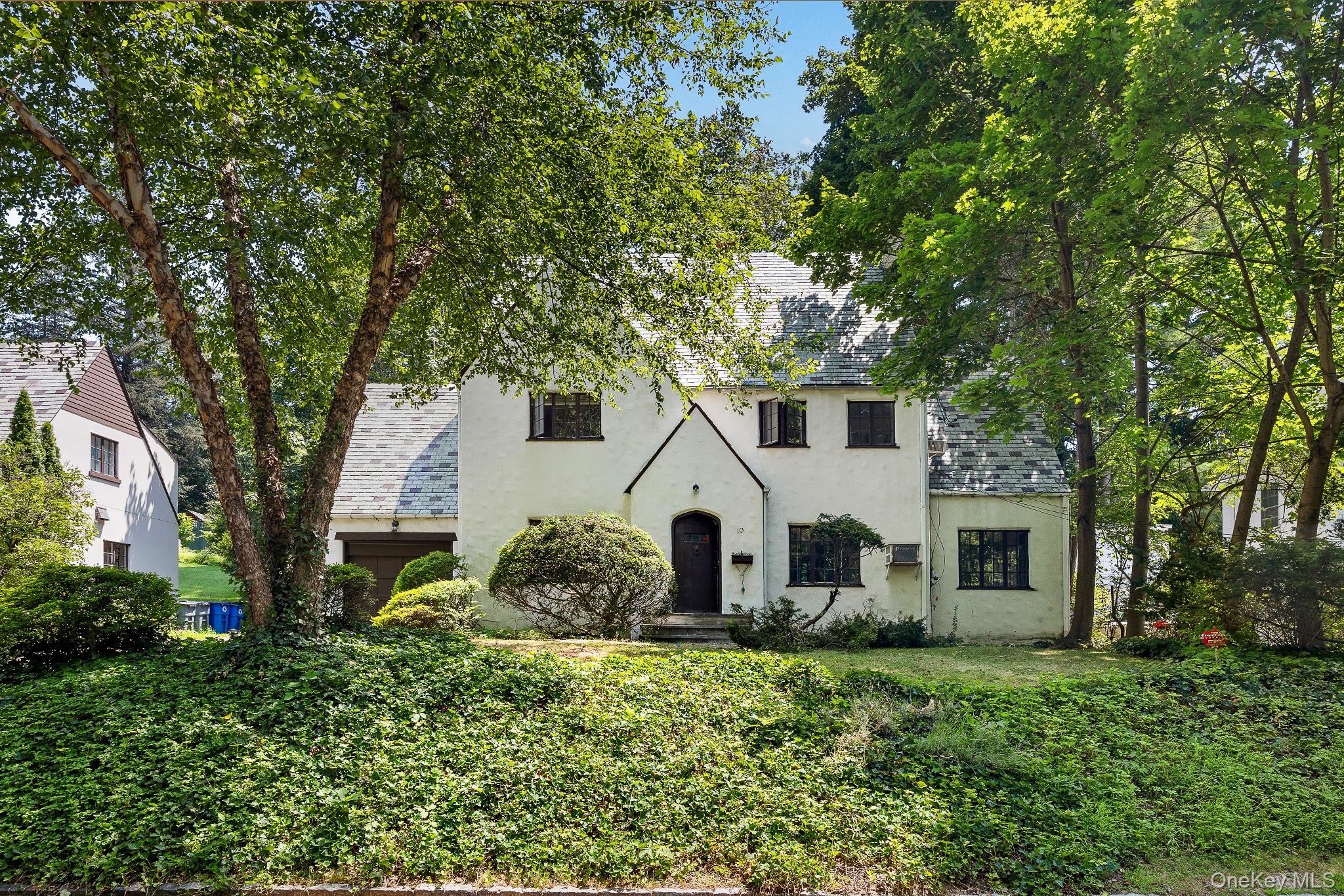 Ideally located in the heart of Greenacres, this charming Tudor-style...