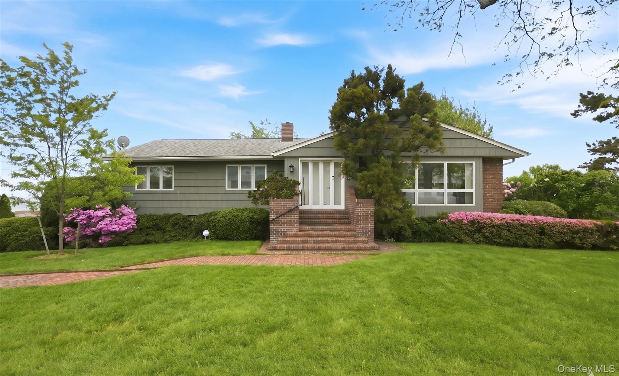 Enjoy breathtaking views of Long Island Sound from this mint-condition...