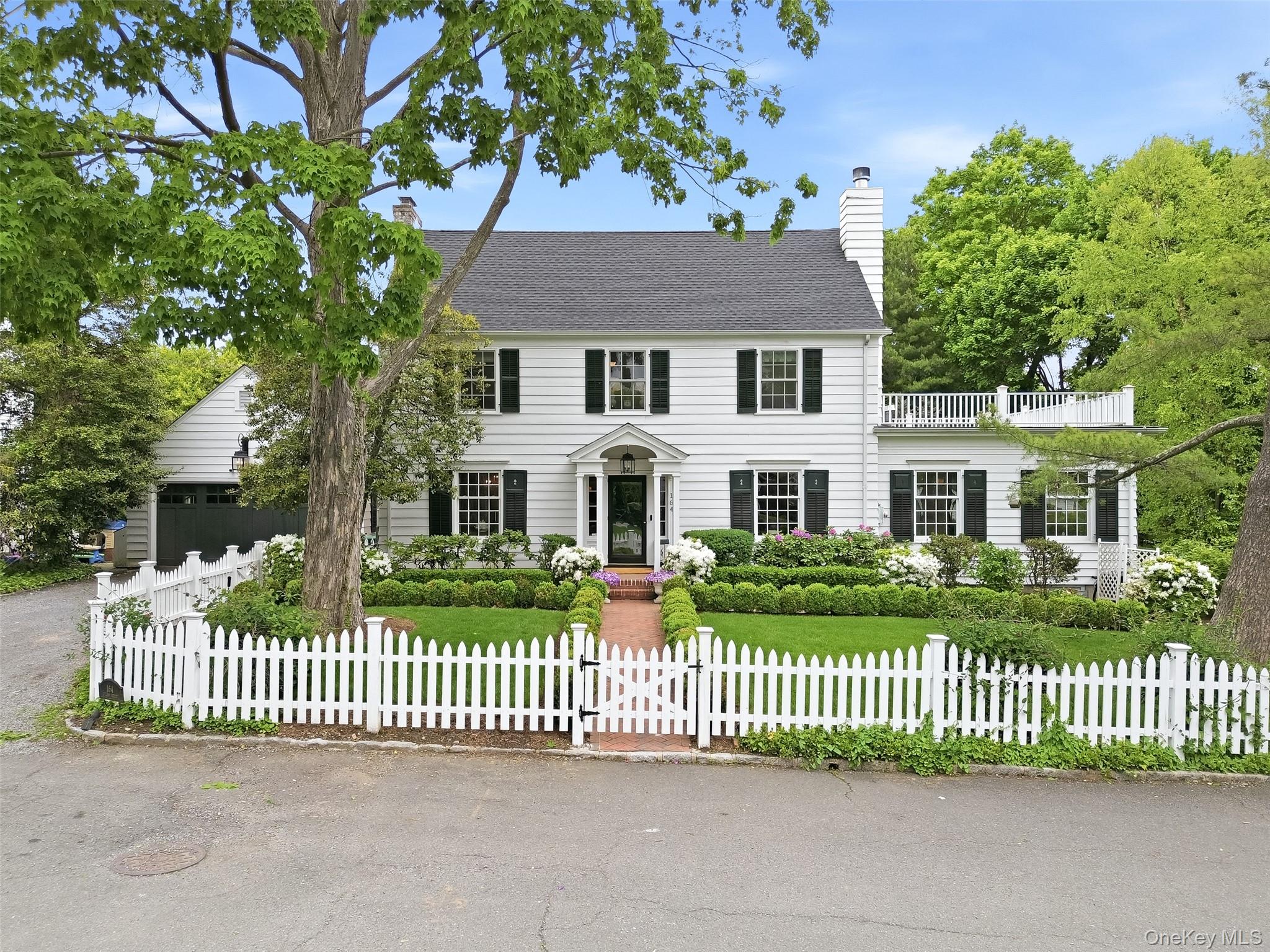 Set on a lush and level .46-acre property at the end of a private no-t...