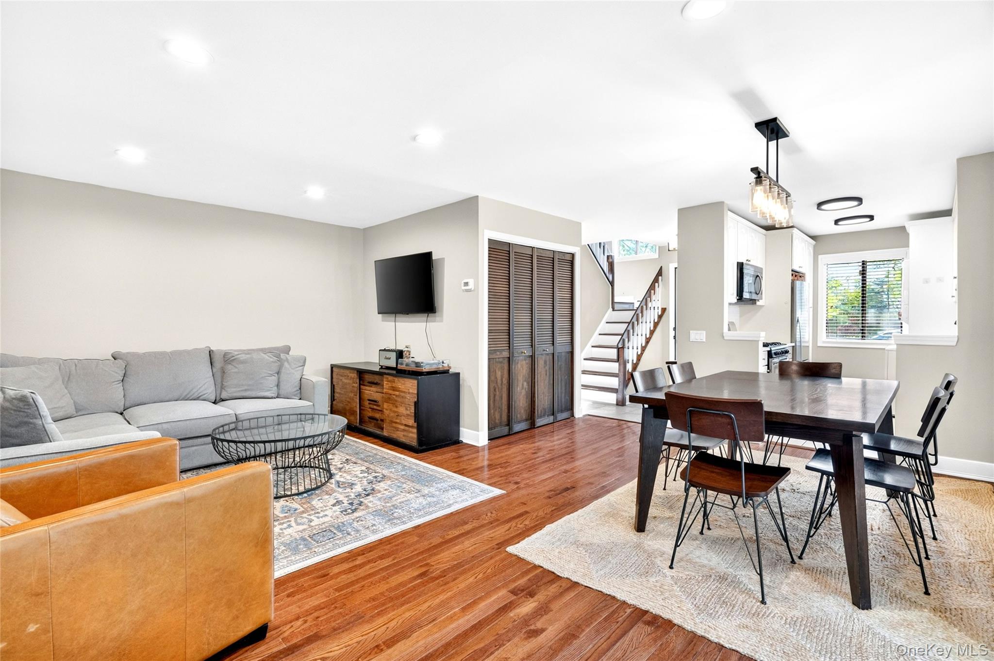 Welcome to 17 Hillside Terrace, Unit D—an updated 3BR end-unit duplex...