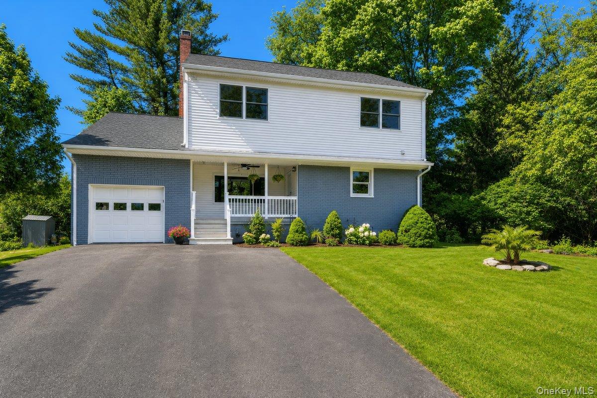 Welcome to this beautiful single-family Colonial home, perfectly nestl...