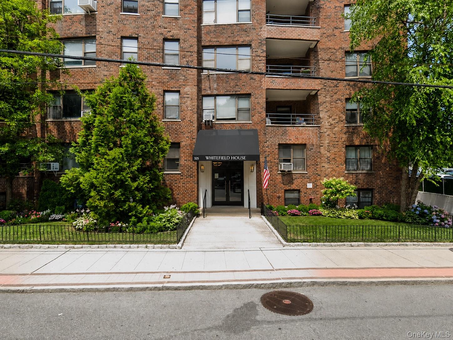 Charming one-bedroom apartment with indoor assigned parking located ju...