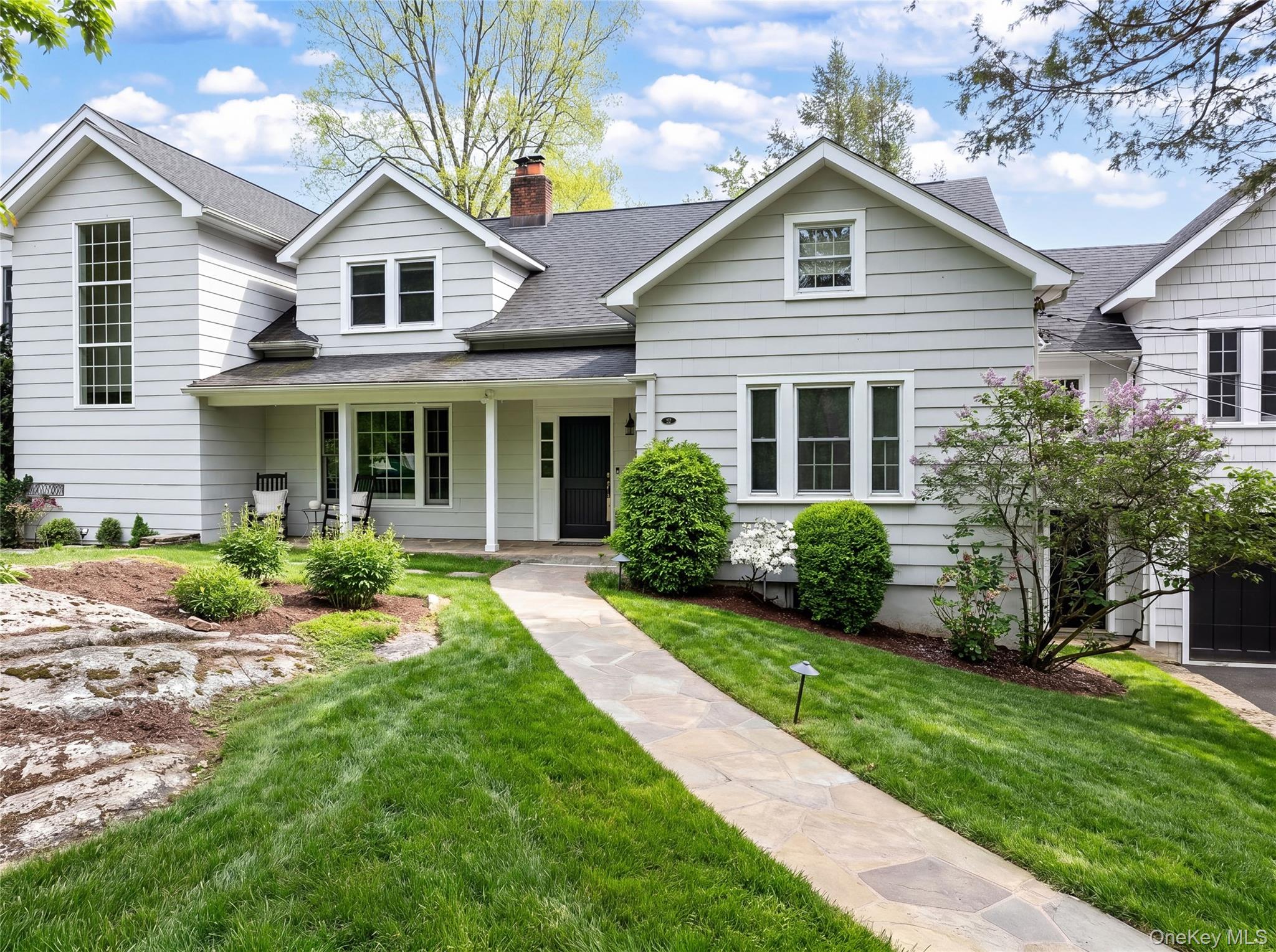 Classic charm meets modern living in this exceptional farmhouse coloni...