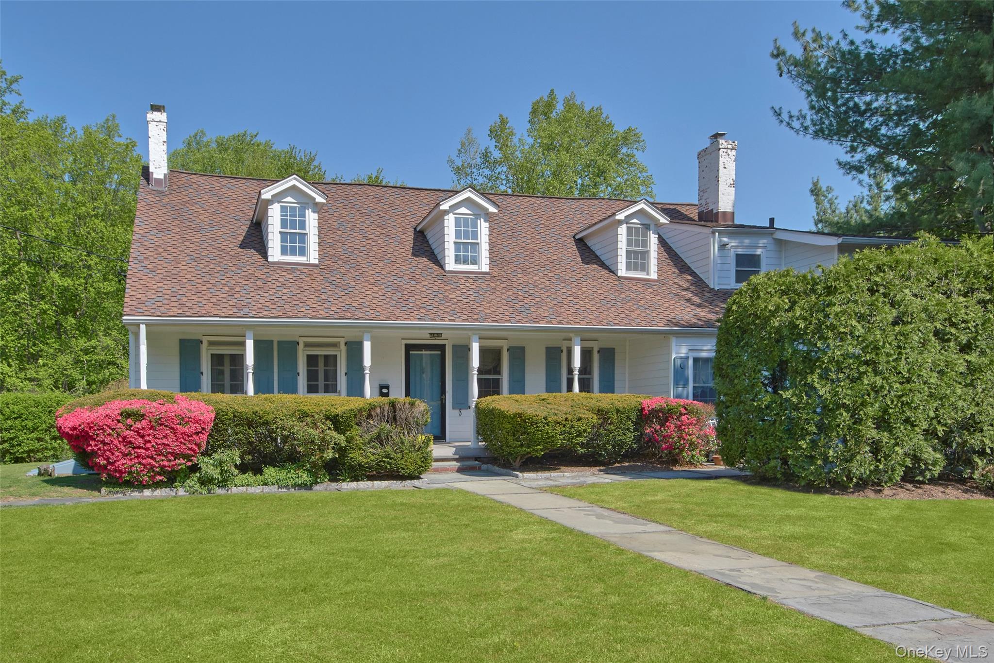 Blending timeless Colonial charm with an expansive footprint, this hom...