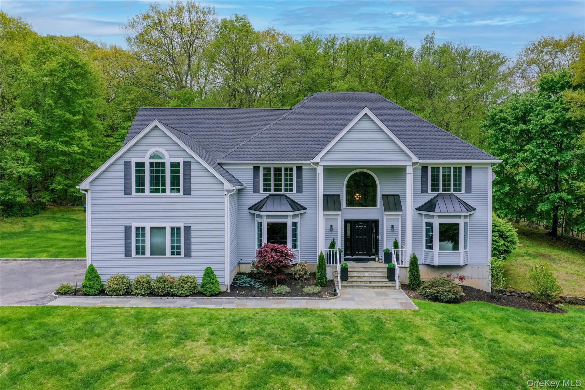 Beautifully renovated and exceptionally private, this impressive Colon...