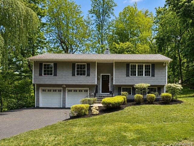 Young, beautifully renovated, and truly turnkey, this warm and invitin...