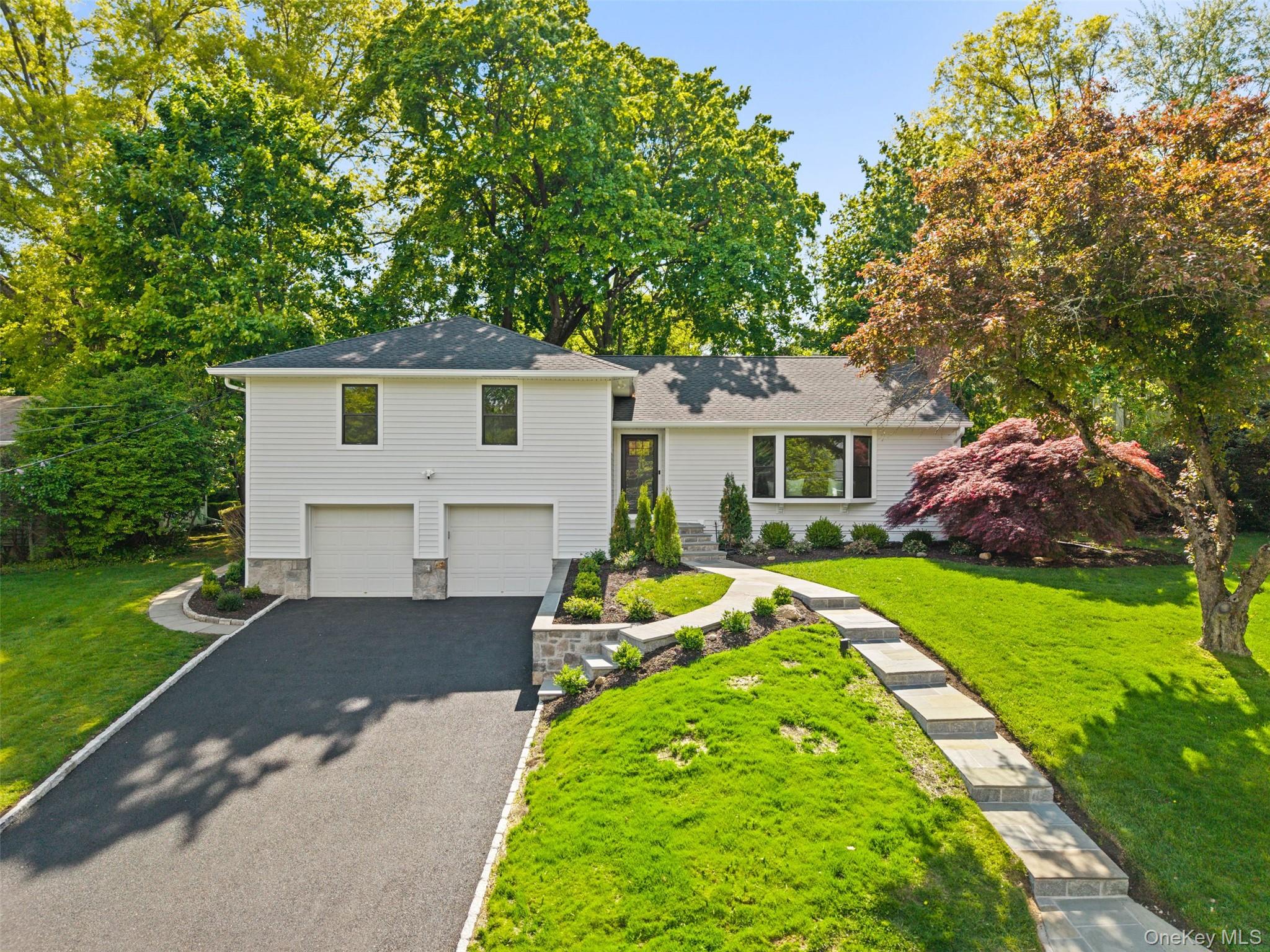 Discover modern luxury and effortless living in the highly sought-afte...