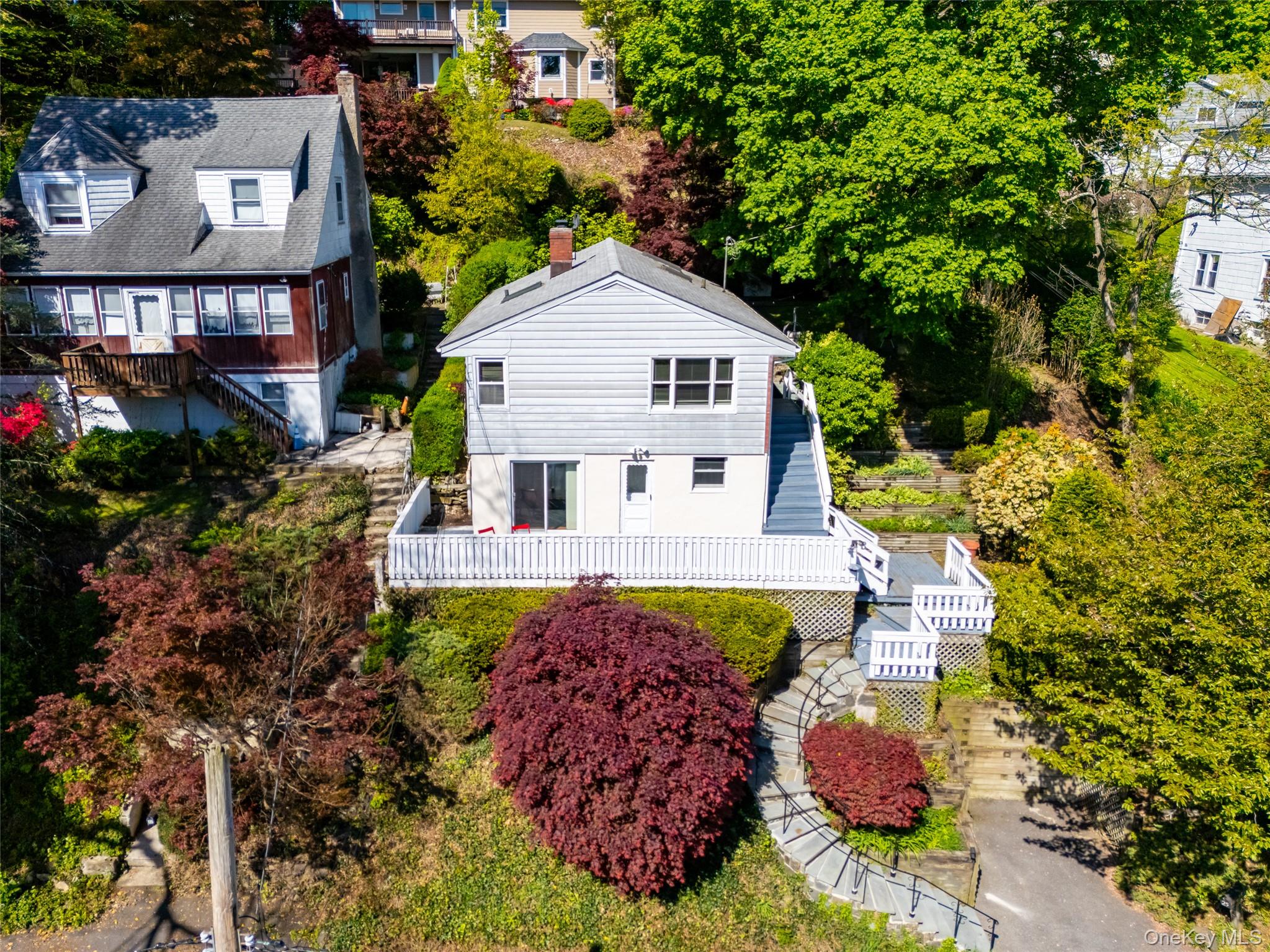 Versatility galore! Lives like a 3 bedroom. This custom-built Ranch, w...