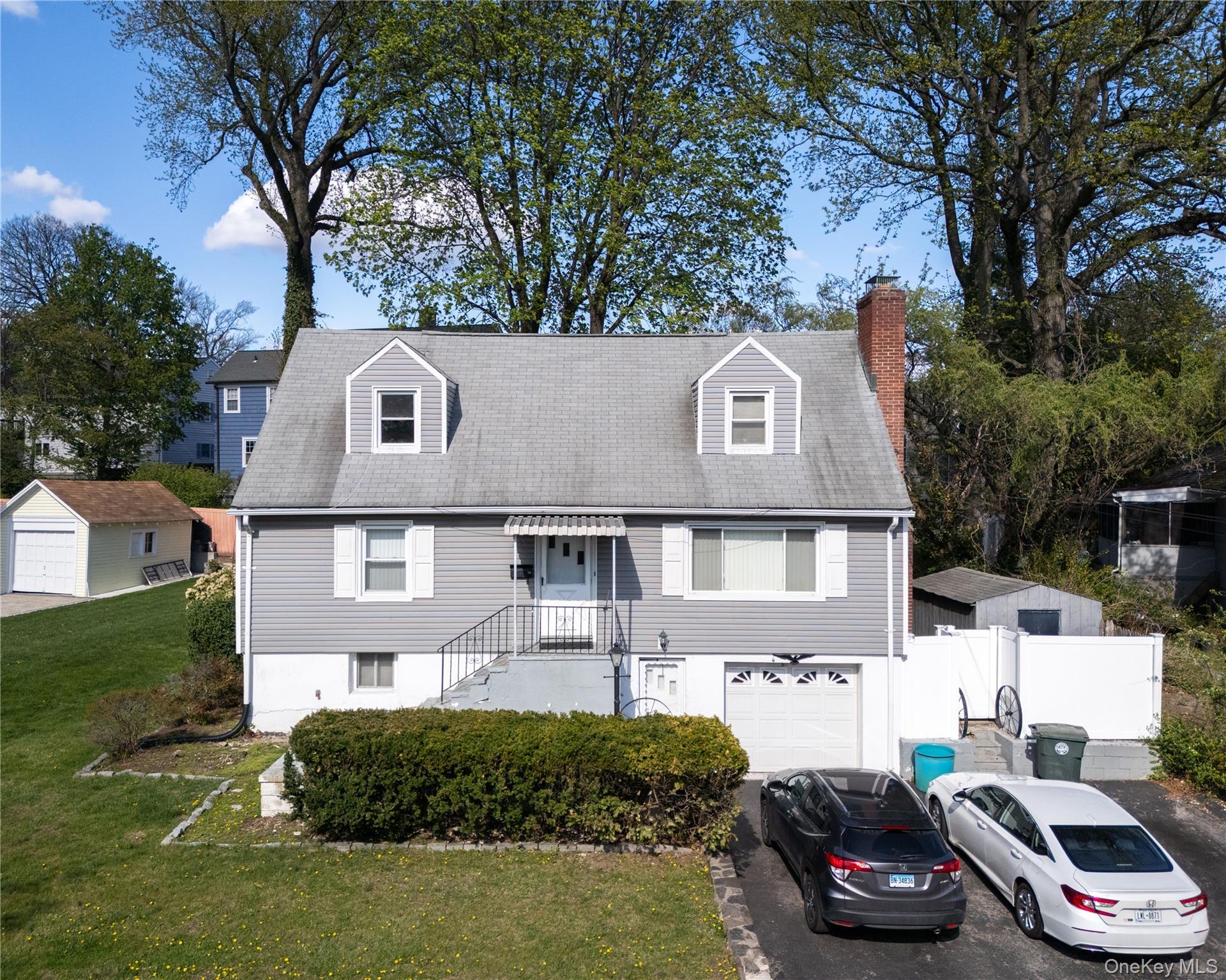 Opportunity to own this four bedroom 2.5 bath cape on corner of tree l...