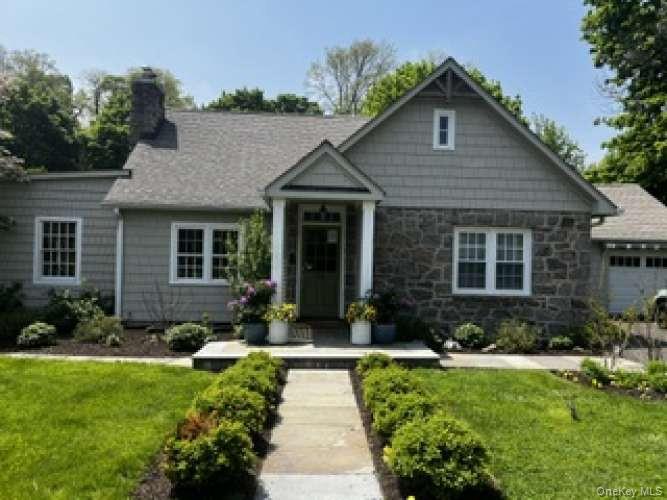 Welcome to 116 Shore Drive, a thoughtfully renovated Cape-style home i...