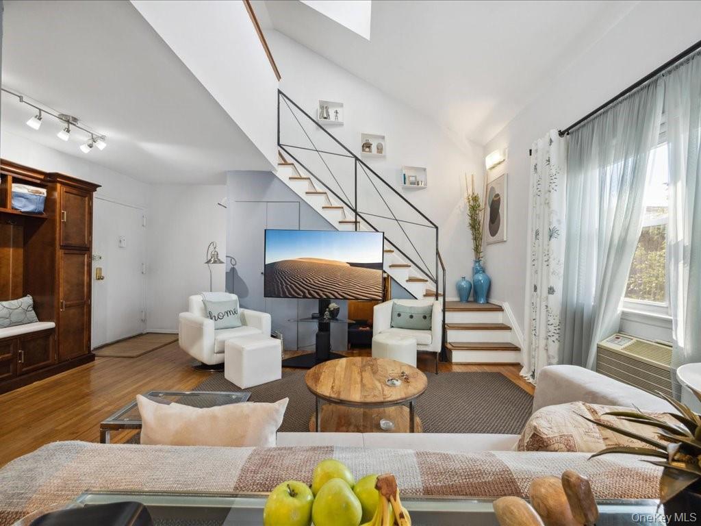 Welcome to this stunning loft-style co-op unit offering two floors of...