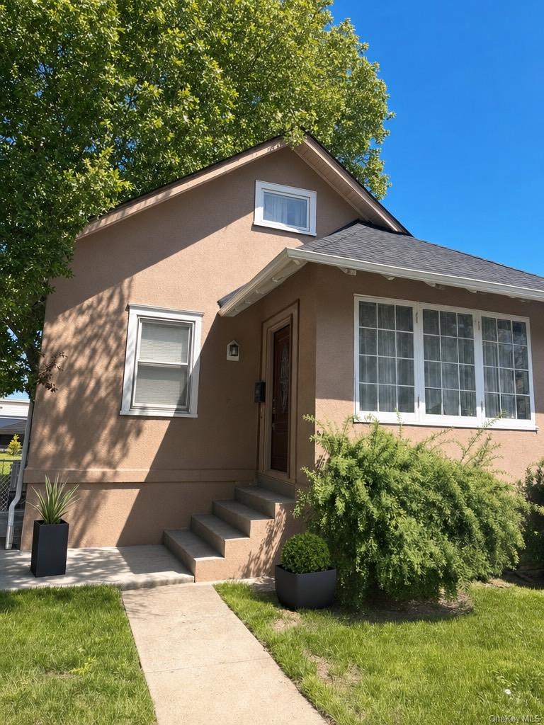 Welcome to this charming, move-in ready A-frame home near the desirabl...