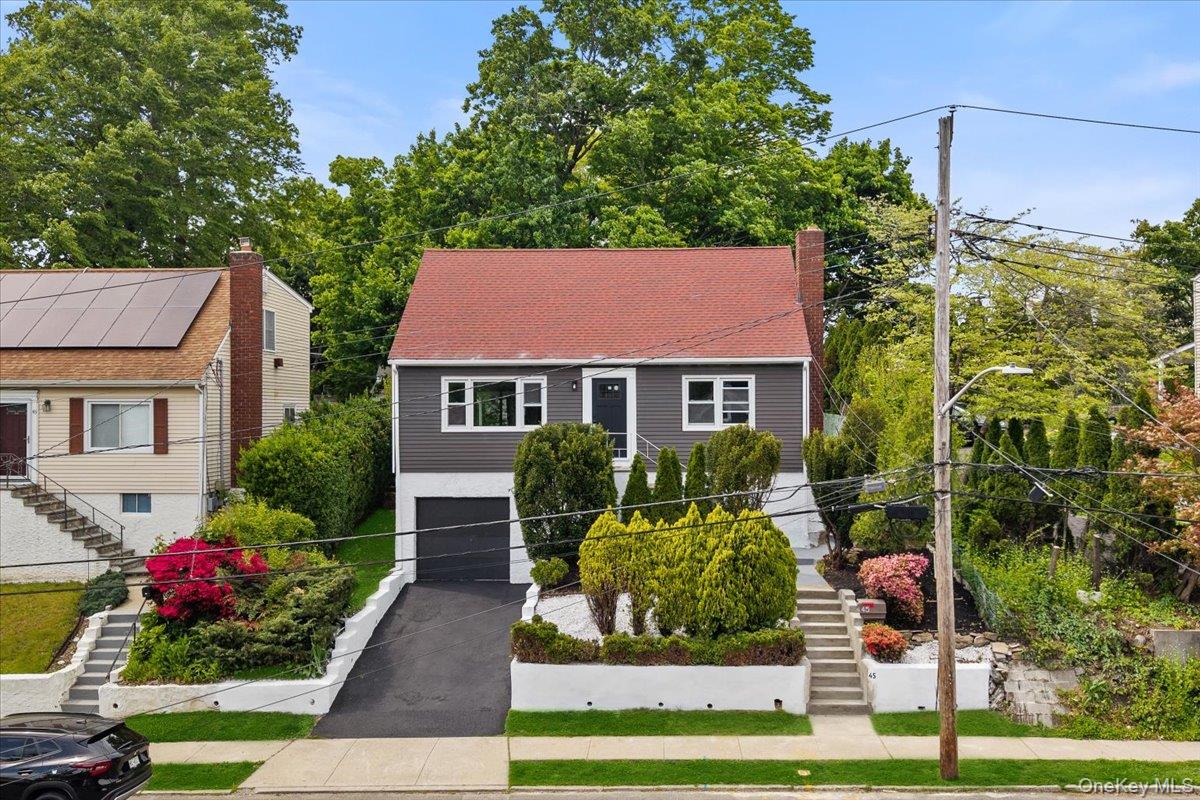 Welcome to 45 North Perkins Avenue in the heart of Elmsford — a beauti...